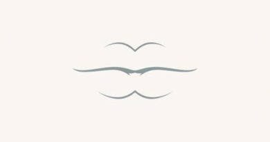 Feigned Kissing Sound Crossword Clue