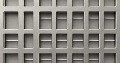 Metal Grating Crossword Clue